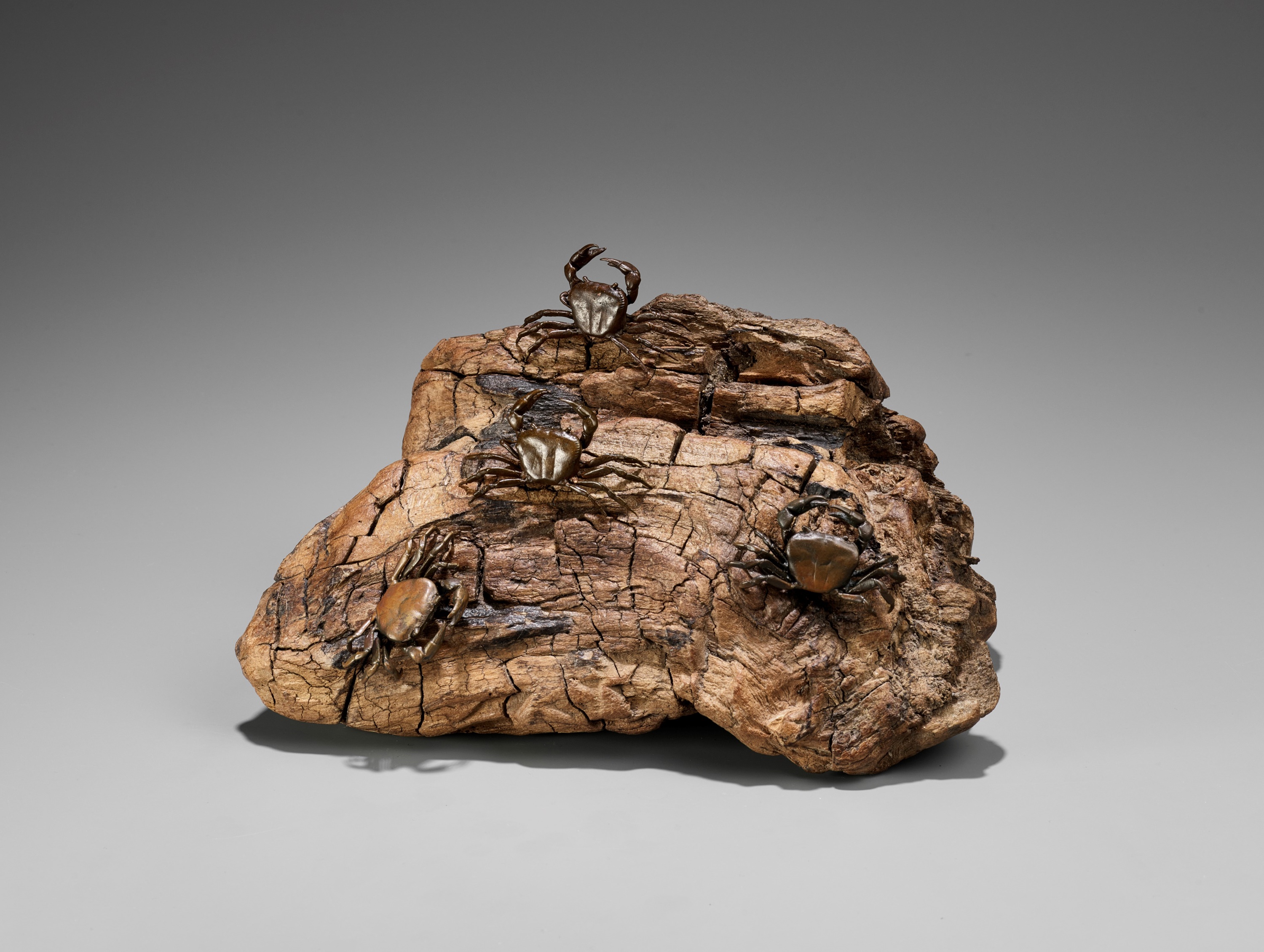 Lot 31 - AN UNUSUAL BRONZE AND ROOTWOOD OKIMONO OF A
