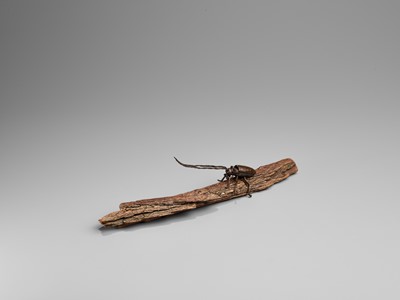 Lot 30 - AN ARTICULATED BRONZE OKIMONO OF A SAWYER BEETLE CLIMBING A ROOTWOOD LOG