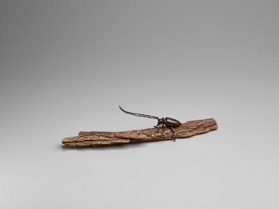 Lot 30 - AN ARTICULATED BRONZE OKIMONO OF A SAWYER BEETLE CLIMBING A ROOTWOOD LOG