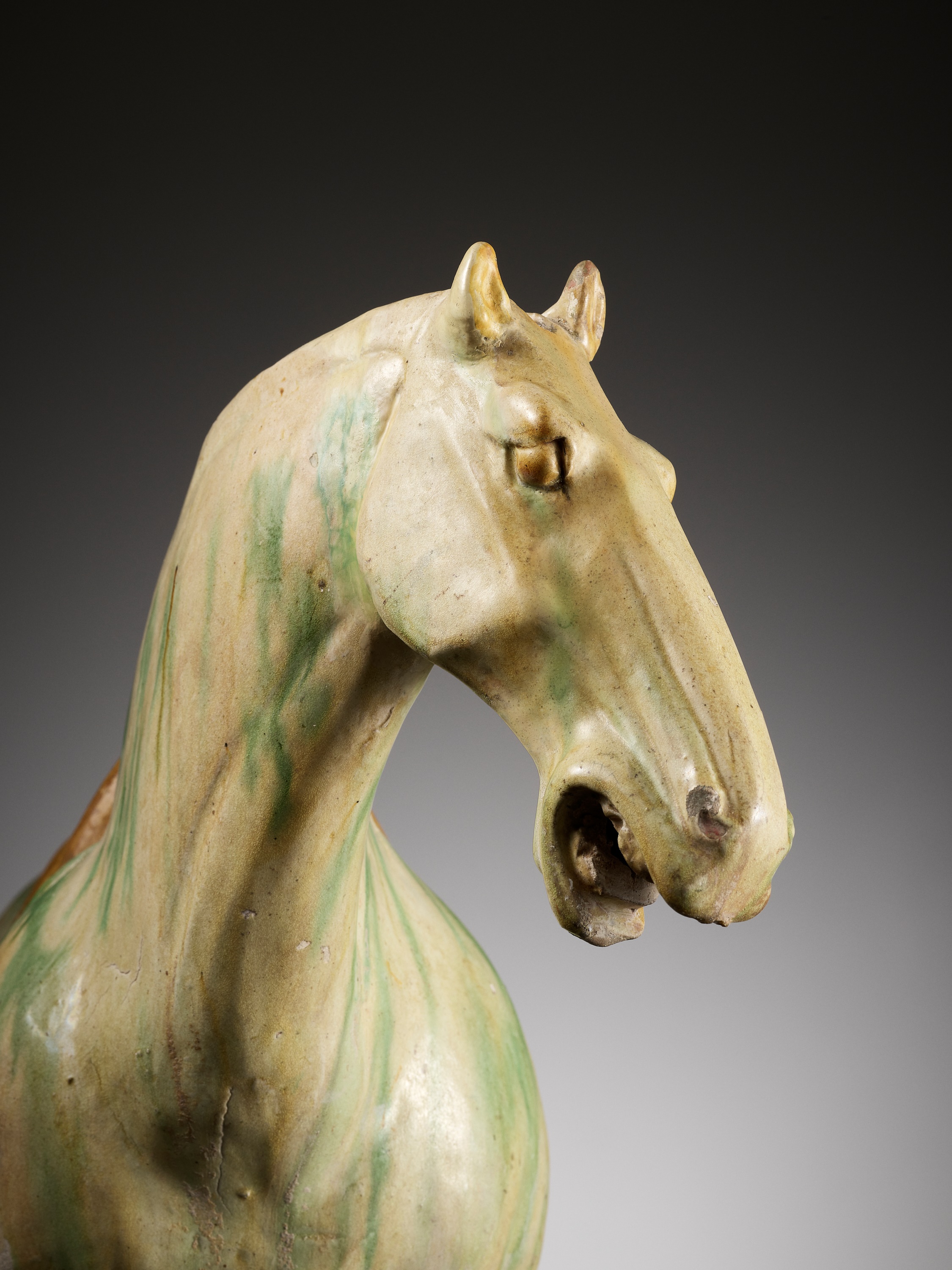 Lot 96 - A LARGE SANCAI GLAZED POTTERY FIGURE OF A