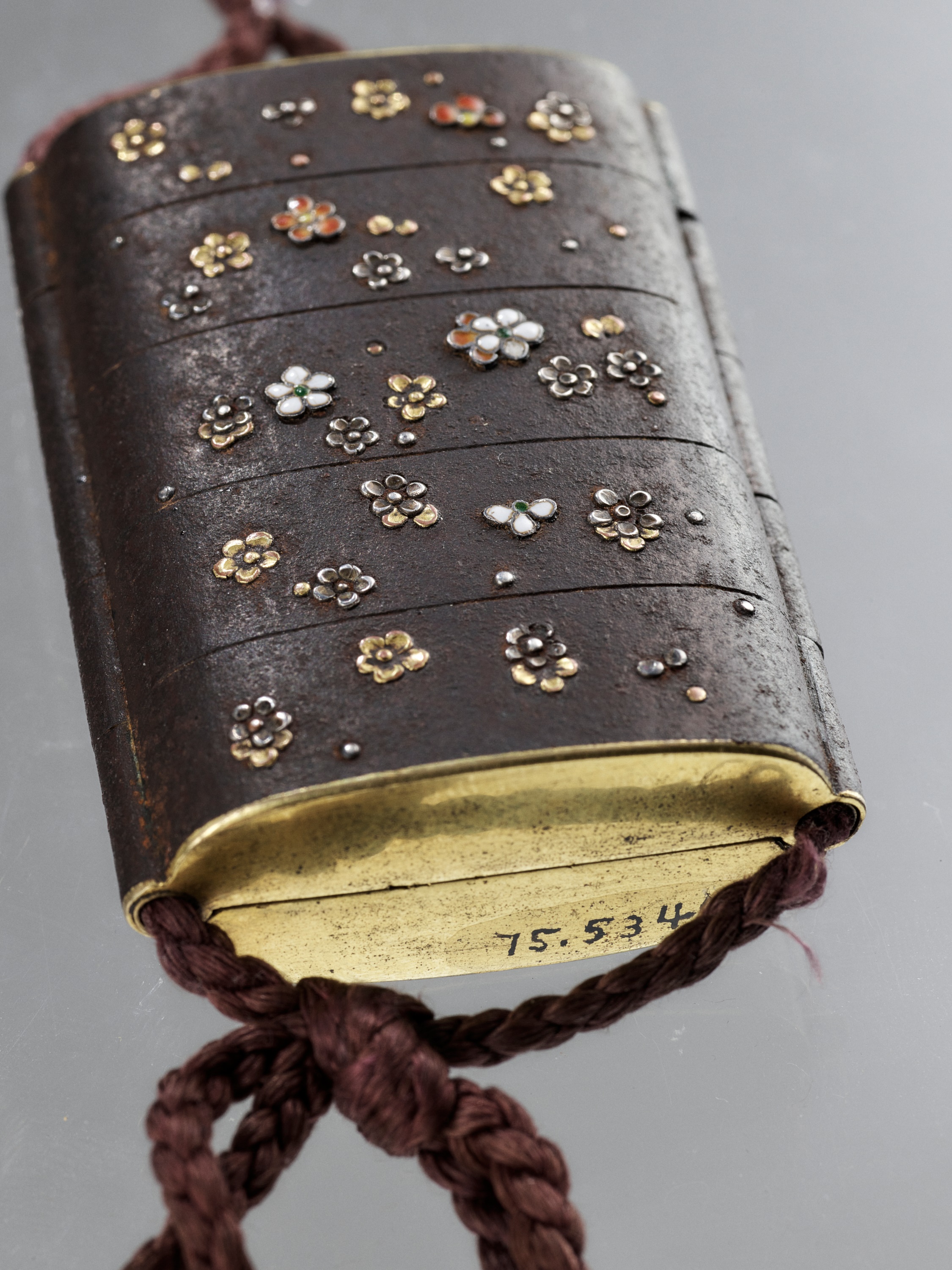 Lot 357 - A VERY RARE CHAMPLEVÉ-DECORATED IRON