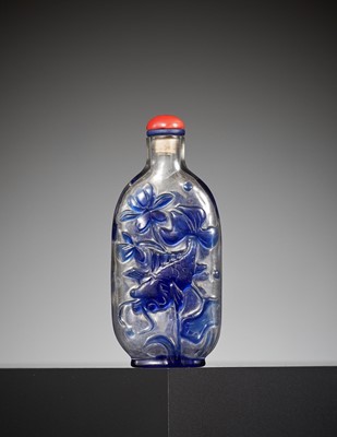 Lot 136 - A SAPPHIRE-BLUE OVERLAY GLASS ‘CELESTIAL EYE’ SNUFF BOTTLE, 18TH-19TH CENTURY