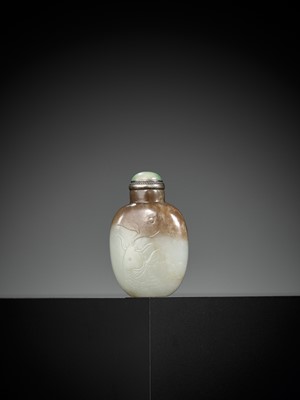 Lot 125 - A WHITE AND BROWN JADE ‘CARP’ SNUFF BOTTLE, 1780-1850