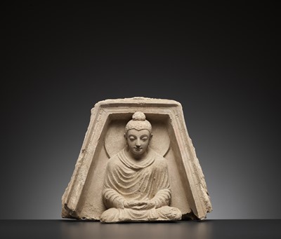Lot 561 - A STUCCO RELIEF DEPICTING BUDDHA IN A TRAPEZOIDAL NICHE, KUSHAN PERIOD