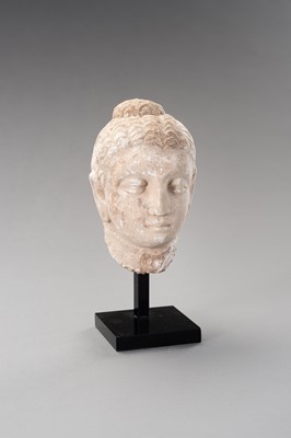 Lot 1138 - A STUCCO HEAD OF BUDDHA, GANDHARA