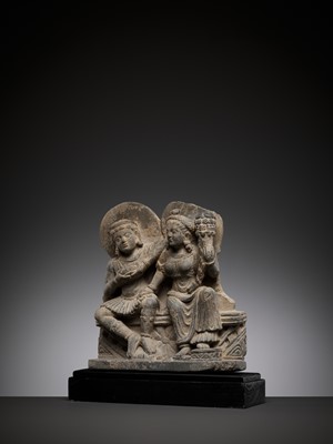 Lot 559 - A SCHIST RELIEF DEPICTING HARITI AND PANCHIKA, KUSHAN PERIOD