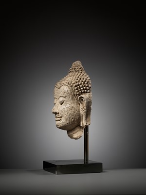 A HARIPUNJAYA STUCCO HEAD OF BUDDHA, THAILAND, 11TH-13TH CENTURY