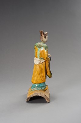 A SANCAI RIDGE TILE WITH DIGNITARY, LATE MING PERIOD