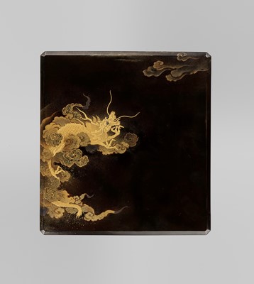 Lot 133 - A BLACK AND GOLD LACQUER SUZURIBAKO WITH DRAGON AND TIGER