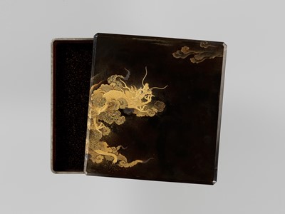 Lot 266 - A BLACK AND GOLD LACQUER SUZURIBAKO WITH DRAGON AND TIGER