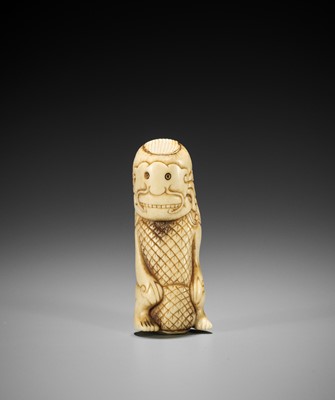 A RARE STAG ANTLER NETSUKE OF A FOREIGN DEVIL