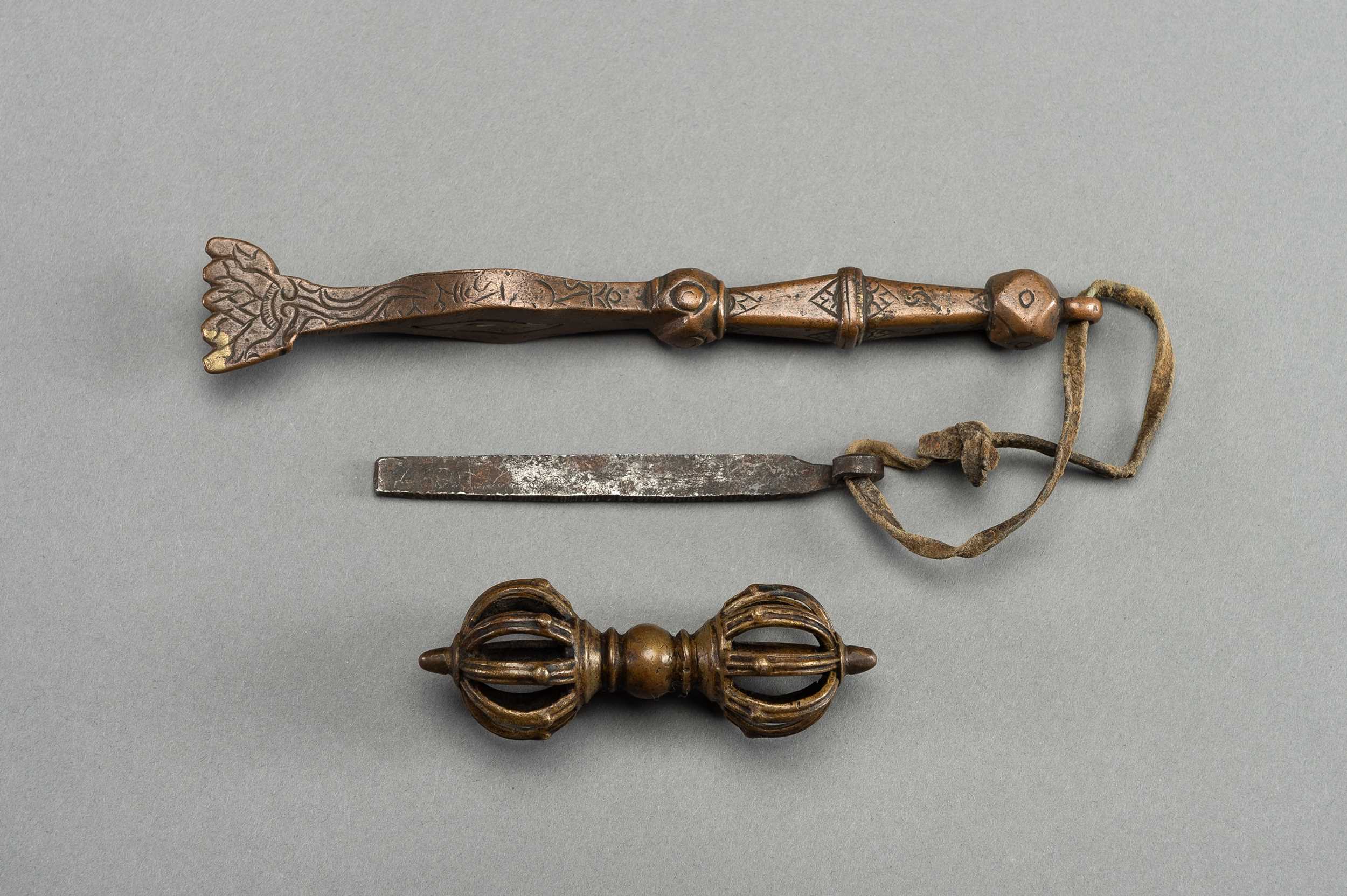 Lot 356 - A BRONZE VAJRA AND TWO RITUAL INSTRUMENTS