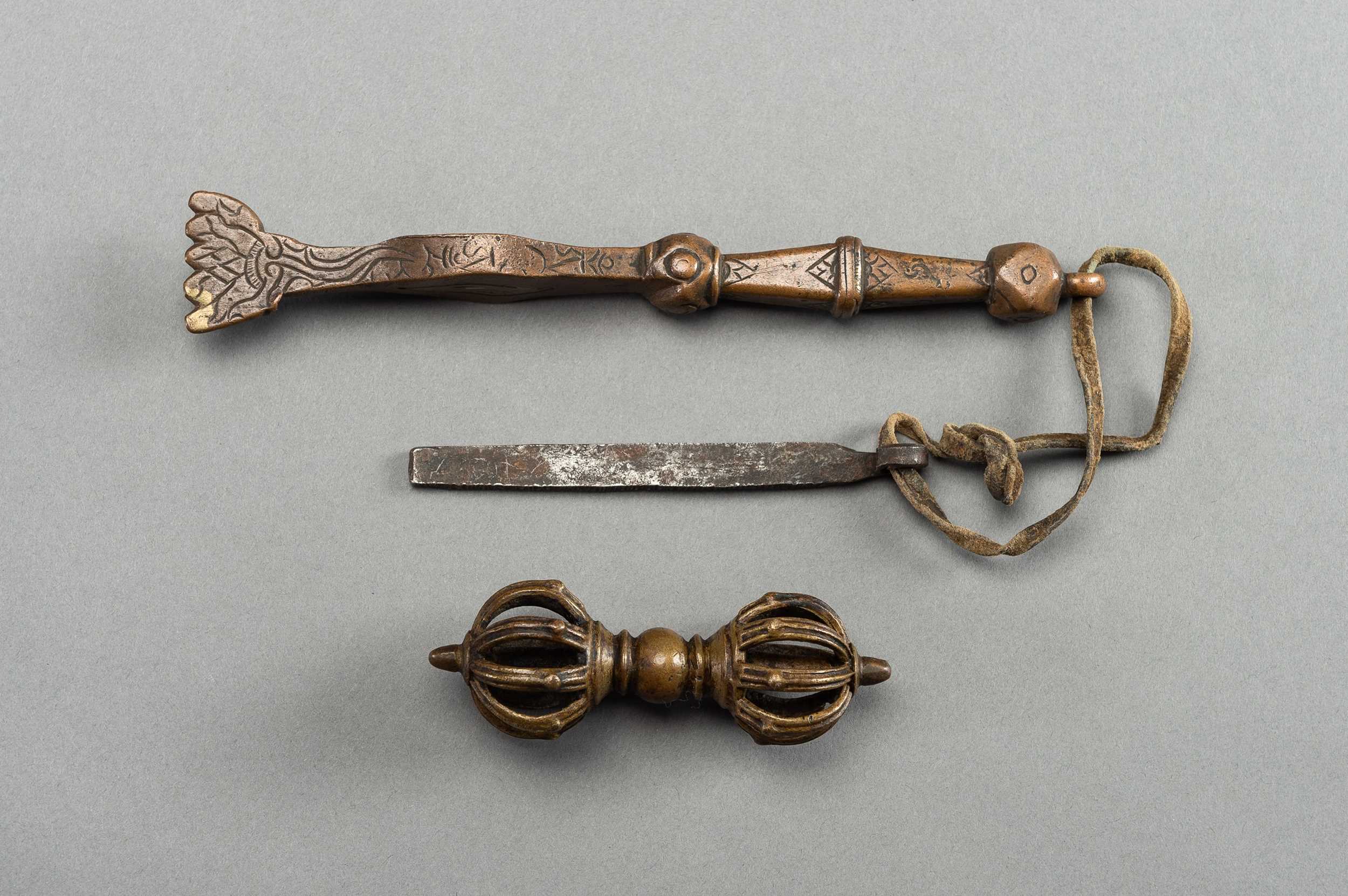 Lot 356 - A BRONZE VAJRA AND TWO RITUAL INSTRUMENTS