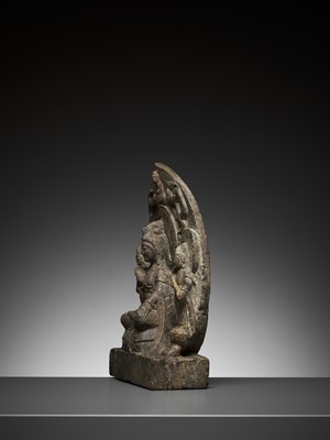 Lot 374 - A LIMESTONE BUDDHIST TRIAD STELE OF GUANYIN, NORTHERN WEI TO TANG DYNASTY