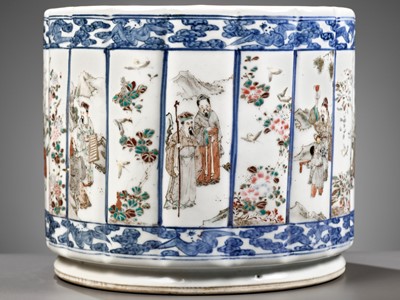 Lot 456 - AN UNDERGLAZE-BLUE-DECORATED AND POLYCHROME ENAMELED RIBBED BRUSHPOT, QING DYNASTY