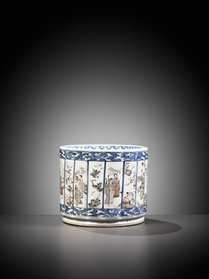 Lot 456 - AN UNDERGLAZE-BLUE-DECORATED AND POLYCHROME ENAMELED RIBBED BRUSHPOT, QING DYNASTY
