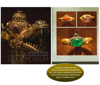 Lot 1168 - A LARGE KHMER GOLD RING WITH AMETHYST