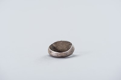 Lot 1226 - A PYU CULTURE SILVER ALLOY ‘LAKSHMI’ RING, 9TH TO 11TH CENTURY