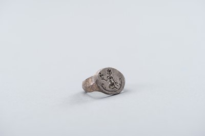 Lot 1226 - A PYU CULTURE SILVER ALLOY ‘LAKSHMI’ RING, 9TH TO 11TH CENTURY