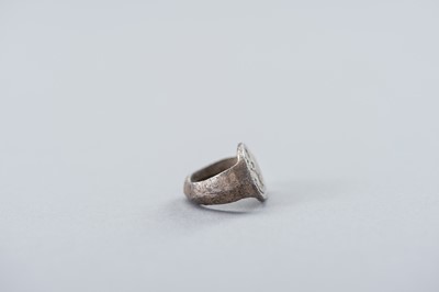 Lot 1226 - A PYU CULTURE SILVER ALLOY ‘LAKSHMI’ RING, 9TH TO 11TH CENTURY