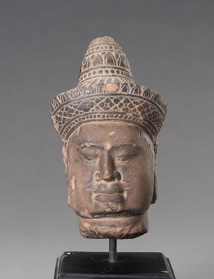 Lot 810 - A STONEWARE MUSEUM COPY OF A KHMER HEAD