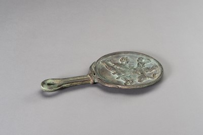 Lot 1153 - A MASSIVE GANDHARA STYLE BRONZE MIRROR WITH A FIGURAL SCENE
