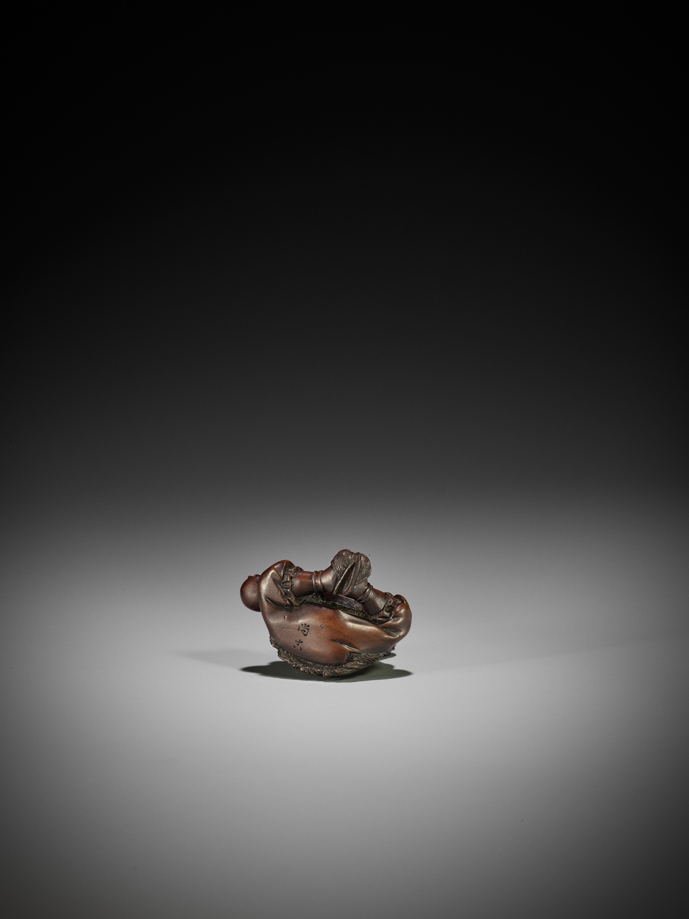 Lot 178 - SHOKO: A RARE WOOD NETSUKE OF URASHIMA TARO