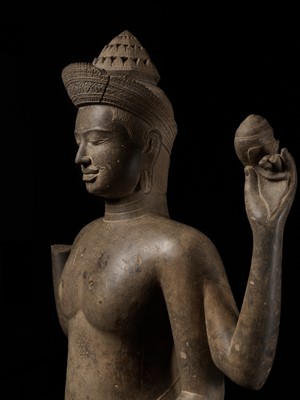 Lot 268 - AN EXTREMELY RARE AND MONUMENTAL SANDSTONE STATUE OF VISHNU, ANGKOR PERIOD