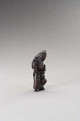 Lot 510 - A WOOD NETSUKE OF SHOKI AND ONI