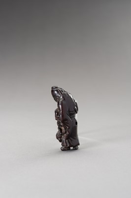 Lot 510 - A WOOD NETSUKE OF SHOKI AND ONI