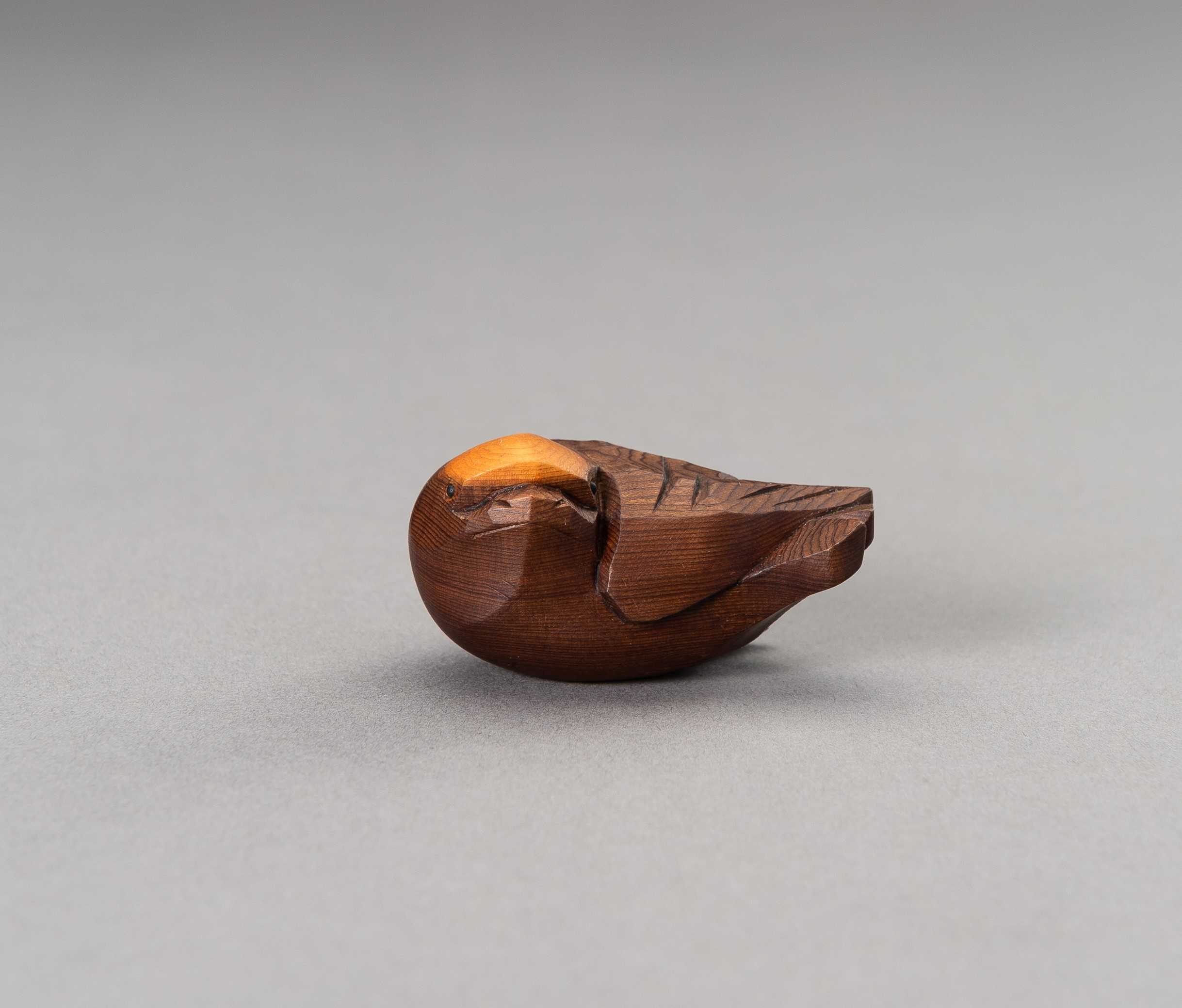 Lot 457 - A HIDA SCHOOL ITTOBORI WOOD NETSUKE OF A SPARROW