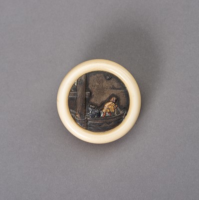 Lot 155 - AN IVORY AND MIXED METAL KAGAMIBUTA NETSUKE DEPICTING TWO FIGURES ON A BOAT