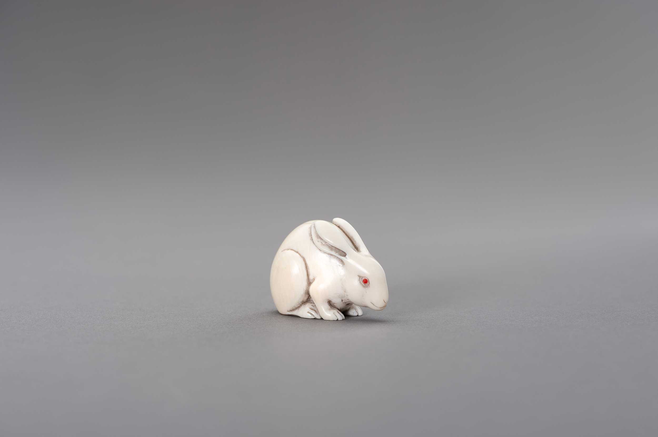 Bonhams : An ivory okimono of Oniwakamaru and carp By