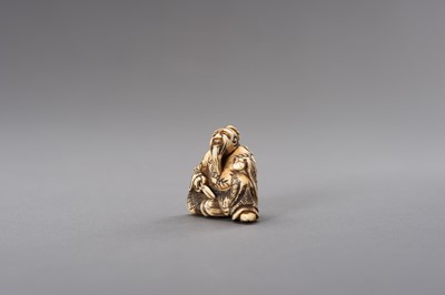 Lot 525 - AN IVORY NETSUKE OF A TAILOR WITH PAIR OF SCISSORS