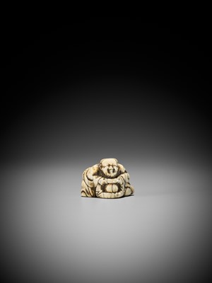 AN IVORY NETSUKE OF A SAGE WITH HOZUKI