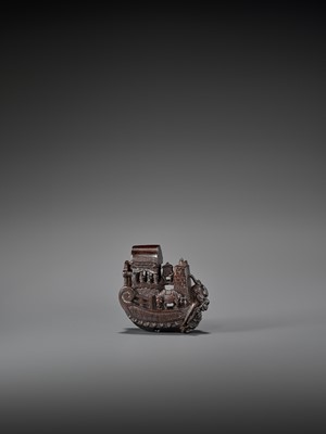 Lot 511 - A WOOD NETSUKE OF TRAVELERS IN A SHIP ATTRIBUTED TO KAGETOSHI