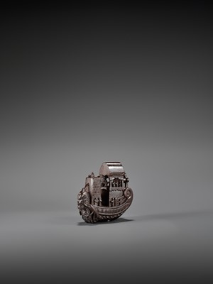 Lot 511 - A WOOD NETSUKE OF TRAVELERS IN A SHIP ATTRIBUTED TO KAGETOSHI