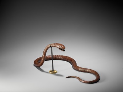 Lot 6 - A RARE AND IMPRESSIVE PATINATED BRONZE ARTICULATED MODEL OF A SNAKE
