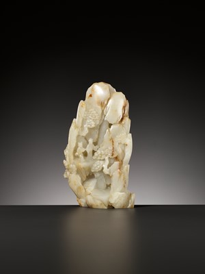Lot 50 - AN IMPORTANT AND RARE PALE CELADON AND RUSSET JADE MOUNTAIN, 18TH CENTURY