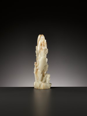 Lot 50 - AN IMPORTANT AND RARE PALE CELADON AND RUSSET JADE MOUNTAIN, 18TH CENTURY