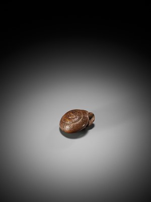 Lot 102 - BOKUZAN: A RARE BAMBOO NETSUKE OF A SNAIL RETRACTED WITHIN ITS SHELL