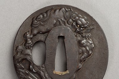 Lot 640 - CHOHAN MITSUTAKA: AN IRON TSUBA WITH SHISHI