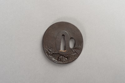 Lot 640 - CHOHAN MITSUTAKA: AN IRON TSUBA WITH SHISHI