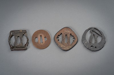 Lot 66 - A GROUP OF FOUR IRON AND COPPER TSUBA
