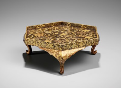 Lot 119 - A GOLD LACQUER HEXAGONAL STAND WITH KUYO MON