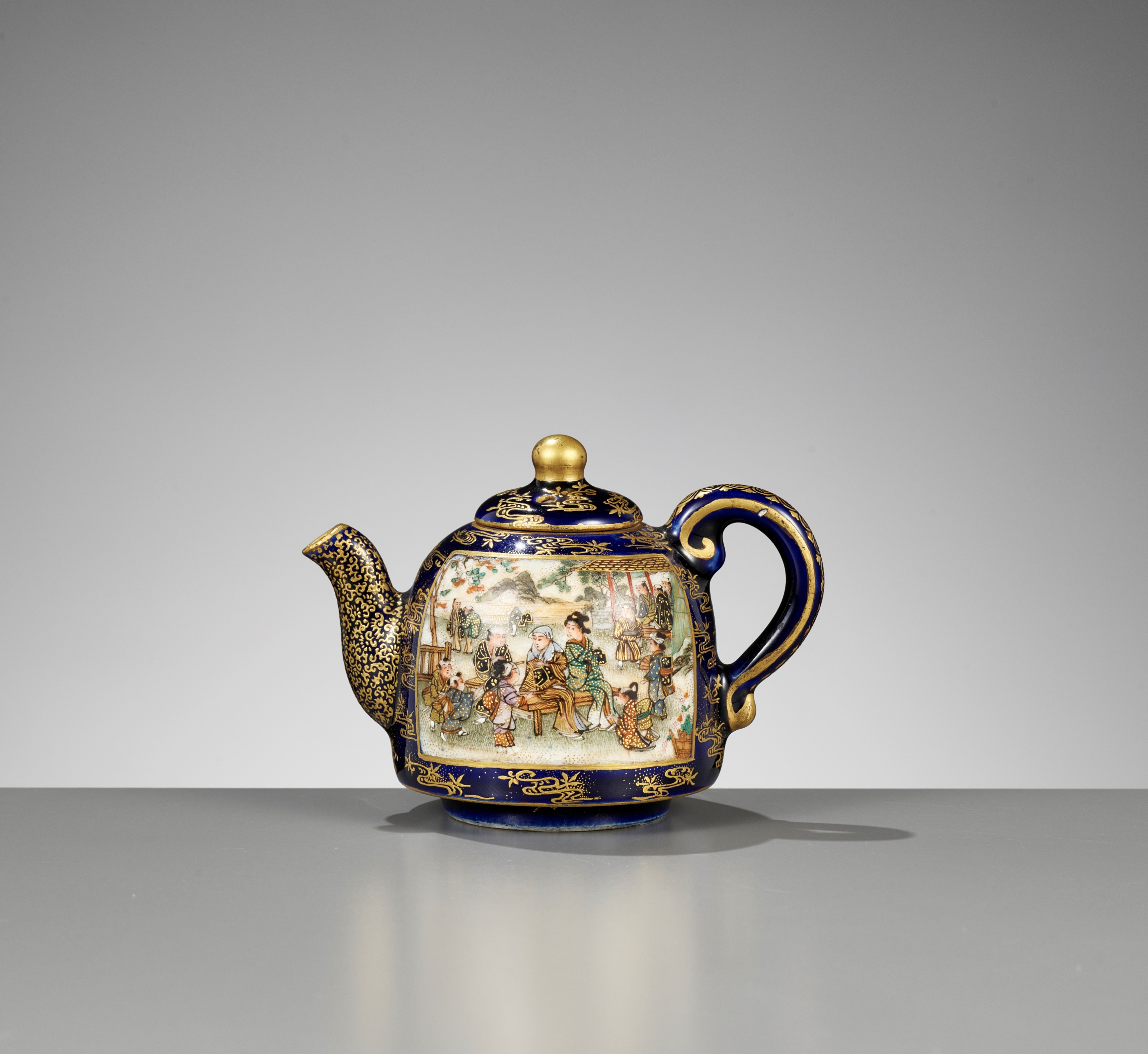 Lot 72 - KINKOZAN: A MINIATURE SATSUMA CERAMIC TEAPOT