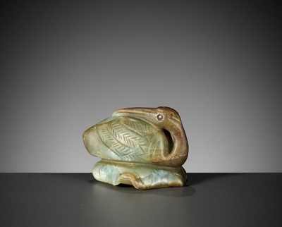 A CELADON AND RUSSET JADE FIGURE OF A CRANE, MING DYNASTY