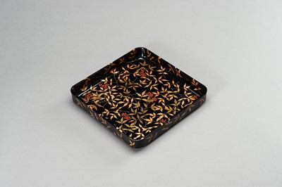 Lot 386 - A BLACK AND GOLD LACQUERED TRAY WITH LYCHEES, 1900s