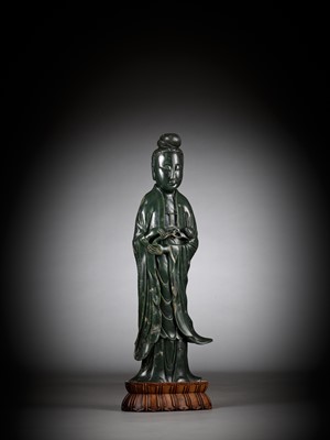 Lot 61 - A LARGE AND MASSIVE SPINACH-GREEN KHOTAN JADE FIGURE OF GUANYIN, PROBABLY TAKEN FROM THE OLD SUMMER PALACE IN BEIJING IN 1861