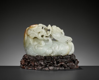 Lot 48 - A CELADON AND RUSSET JADE ‘QILIN AND CRANES’ GROUP, 18TH CENTURY